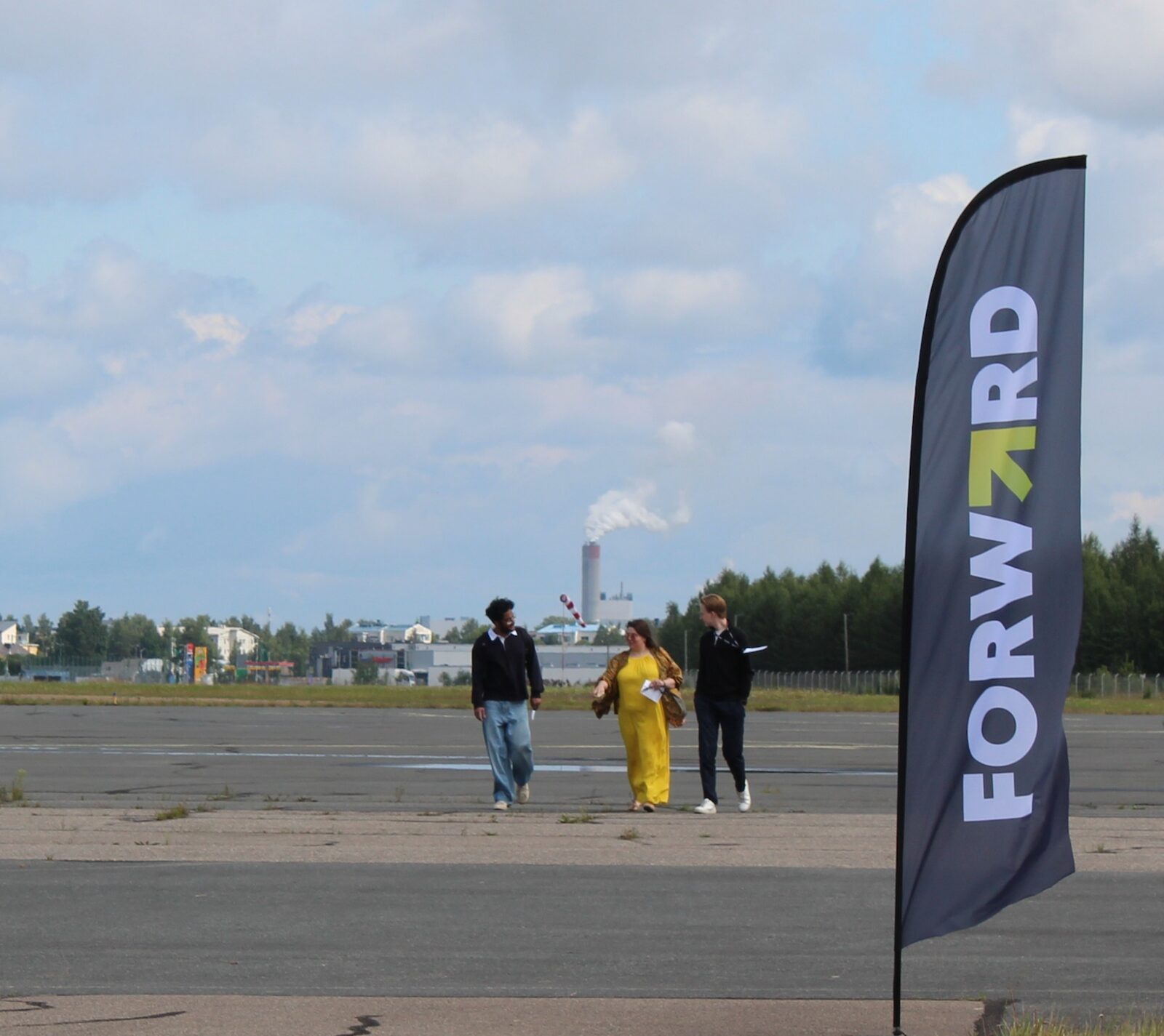 Sponsor branded beach flag at an outdoor event